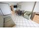 Living room with dining table, sofa, and tiled floor at 1501 S Ocean Blvd. # 1540, Myrtle Beach, SC 29577