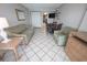 Comfortable living room with sofa, chairs, and dining table at 1501 S Ocean Blvd. # 1540, Myrtle Beach, SC 29577