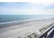 Stunning panoramic view of the ocean and sandy beach from a high-rise balcony at 1501 S Ocean Blvd. # 1540, Myrtle Beach, SC 29577