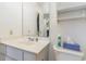 Simple bathroom with vanity, toilet, and mirror at 8725 Chandler Dr. # F, Surfside Beach, SC 29575