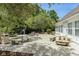 Community patio area with tables, benches, and grills at 8725 Chandler Dr. # F, Surfside Beach, SC 29575