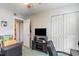Functional bedroom with built-in closet and TV at 8725 Chandler Dr. # F, Surfside Beach, SC 29575