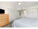 Comfortable bedroom with a queen-size bed and dresser at 8725 Chandler Dr. # F, Surfside Beach, SC 29575