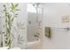 Bathroom with a shower/tub combo and a leafy shower curtain at 8725 Chandler Dr. # F, Surfside Beach, SC 29575