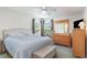 Spacious bedroom with a king-size bed and dresser at 8725 Chandler Dr. # F, Surfside Beach, SC 29575