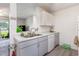 Efficient kitchen featuring ample counter space and a dishwasher at 8725 Chandler Dr. # F, Surfside Beach, SC 29575