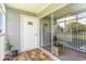 Screened porch with sliding glass doors and wood flooring at 8725 Chandler Dr. # F, Surfside Beach, SC 29575