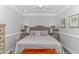 Main bedroom with king bed, nightstands, and walk-in closet at 6001- Mh12B S Kings Hwy., Myrtle Beach, SC 29575