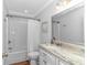 Bathroom with a shower/tub combo, granite countertop, and white vanity at 6001- Mh12B S Kings Hwy., Myrtle Beach, SC 29575