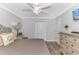 Primary bedroom with a queen bed, dresser, and ceiling fan at 6001- Mh12B S Kings Hwy., Myrtle Beach, SC 29575