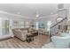 Living room with comfy seating, hardwood floors, and a flat-screen TV at 6001- Mh12B S Kings Hwy., Myrtle Beach, SC 29575
