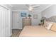 Primary bedroom with a king bed, dresser, and ceiling fan at 6001- Mh12B S Kings Hwy., Myrtle Beach, SC 29575