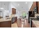 Well-equipped kitchen featuring granite countertops and wood cabinetry at 1433 Beaumont Way, Myrtle Beach, SC 29577