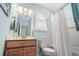 Clean bathroom with a shower/tub combo, vanity, and toilet at 1433 Beaumont Way, Myrtle Beach, SC 29577