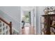 Entryway with hardwood floors and stairs leading upstairs at 1433 Beaumont Way, Myrtle Beach, SC 29577