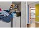 Convenient laundry room with washer, dryer, and extra storage shelves at 4396 Baldwin Ave. # 109, Little River, SC 29566