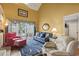 Relaxing living room with blue and yellow decor and water views at 4396 Baldwin Ave. # 109, Little River, SC 29566
