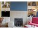 Cozy fireplace with built-in shelving at 4396 Baldwin Ave. # 109, Little River, SC 29566