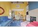 Spacious living room with fireplace and high ceilings at 4396 Baldwin Ave. # 109, Little River, SC 29566