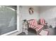Cozy front porch with seating and a welcoming wreath at 4396 Baldwin Ave. # 109, Little River, SC 29566