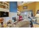 Spacious living room with fireplace, comfy seating, and water views at 4396 Baldwin Ave. # 109, Little River, SC 29566