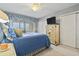 Comfortable bedroom with private balcony access at 4396 Baldwin Ave. # 109, Little River, SC 29566