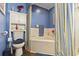 Bathroom featuring a toilet, bathtub, and a linen cabinet at 4396 Baldwin Ave. # 109, Little River, SC 29566