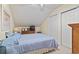 Cozy bedroom with a double bed, dresser, and plenty of closet space at 4396 Baldwin Ave. # 109, Little River, SC 29566