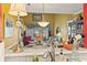 Kitchen with a breakfast nook and view into the living room at 4396 Baldwin Ave. # 109, Little River, SC 29566