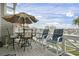 Private deck overlooking the marina with seating for four at 4396 Baldwin Ave. # 109, Little River, SC 29566