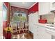 Kitchen features white cabinets, breakfast nook, and adjacent dining area at 4396 Baldwin Ave. # 109, Little River, SC 29566