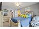 Bright bedroom with a comfortable queen-size bed and an ensuite bathroom at 4396 Baldwin Ave. # 109, Little River, SC 29566