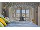 Bedroom with marina views and comfortable bedding at 4396 Baldwin Ave. # 109, Little River, SC 29566