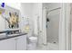 Modern bathroom with a walk-in shower, granite countertop, and stylish decor at 242 Sun Colony Blvd. # 101, Longs, SC 29568
