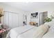 Bright bedroom with a queen bed, workspace, and ample closet space at 242 Sun Colony Blvd. # 101, Longs, SC 29568