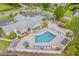 Relaxing community pool with hot tub and lounge chairs, perfect for residents at 242 Sun Colony Blvd. # 101, Longs, SC 29568