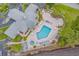 Community pool and spa with lounge chairs and seating area for relaxation at 242 Sun Colony Blvd. # 101, Longs, SC 29568