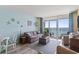 Living room with ocean view and comfy seating at 2801 S Ocean Blvd. # 1838, North Myrtle Beach, SC 29582