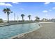 Relaxing resort-style pool with lounge chairs at 2801 S Ocean Blvd. # 1838, North Myrtle Beach, SC 29582