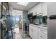 Clean and bright kitchen with white cabinets and ocean view at 2801 S Ocean Blvd. # 1838, North Myrtle Beach, SC 29582