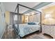 Main bedroom with a four-poster bed and coastal-themed bedding at 2801 S Ocean Blvd. # 1838, North Myrtle Beach, SC 29582
