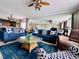Bright living room features ample seating and a view to the dining area at 1401 S Ocean Blvd. # 1001, North Myrtle Beach, SC 29582