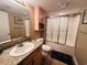Single vanity, granite countertop, and a tub shower combo at 1401 S Ocean Blvd. # 1001, North Myrtle Beach, SC 29582