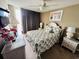 Bright bedroom with a comfortable bed and ocean view at 1401 S Ocean Blvd. # 1001, North Myrtle Beach, SC 29582