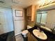 Bathroom with toilet, sink, and shower at 1401 S Ocean Blvd. # 1001, North Myrtle Beach, SC 29582