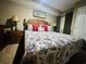King-size bed with patterned bedding and wooden nightstands at 1401 S Ocean Blvd. # 1001, North Myrtle Beach, SC 29582