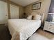 Cozy bedroom with a comfortable bed and nightstands at 1401 S Ocean Blvd. # 1001, North Myrtle Beach, SC 29582