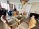 Charming dining area features a glass-top table and wicker chairs at 1401 S Ocean Blvd. # 1001, North Myrtle Beach, SC 29582