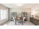 Bright home office with built-in shelving and large window at 7089 Watercress St, Myrtle Beach, SC 29579