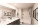 Bathroom with double vanity and bathtub shower combo at 7089 Watercress St, Myrtle Beach, SC 29579